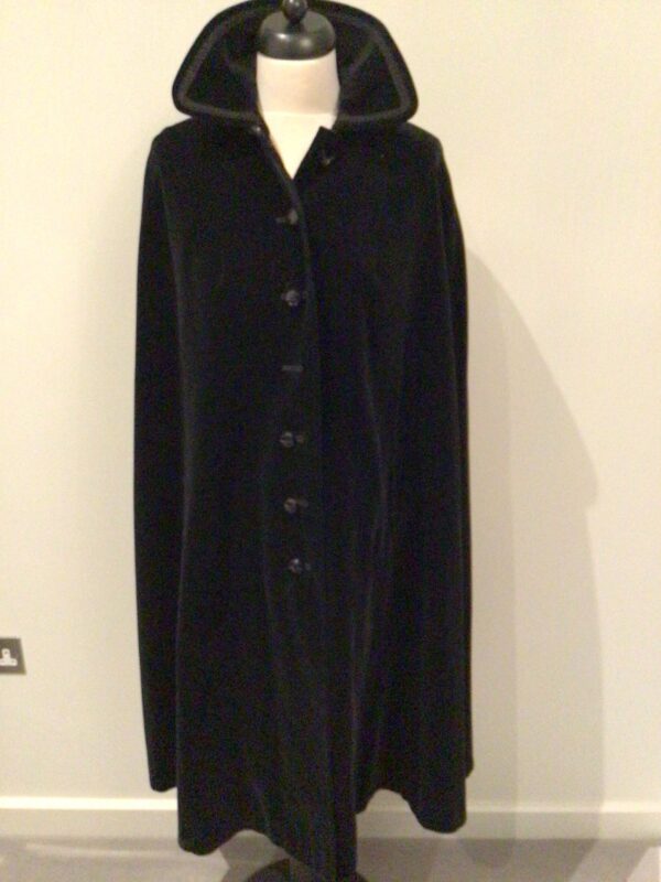 Vintage 70s Dereta, England black cotton velvet midi cape, collar, braid trim, slit pockets, free size